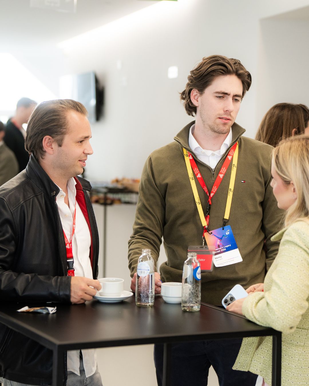 Antonia in conversation at a conference